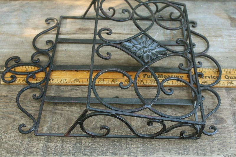 photo of vintage wrought iron magazine rack, heavy ornate black metal wall mount hanging storage #4