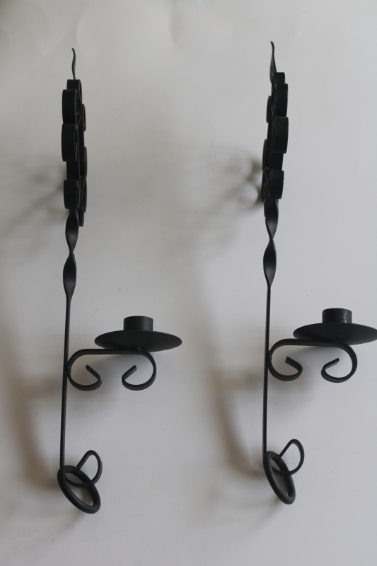 photo of vintage wrought iron wall sconces, old southwest style black metal wall hanging candle holders  #8