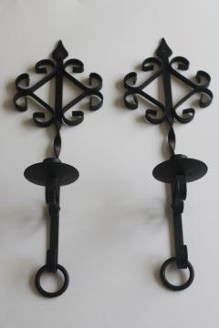 vintage wrought iron wall sconces, old southwest style black metal wall hanging candle holders 