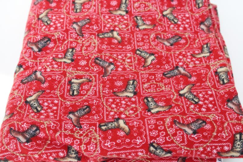 photo of western boots on red bandana print cotton flannel fabric, cowboy / cowgirl dude ranch #1