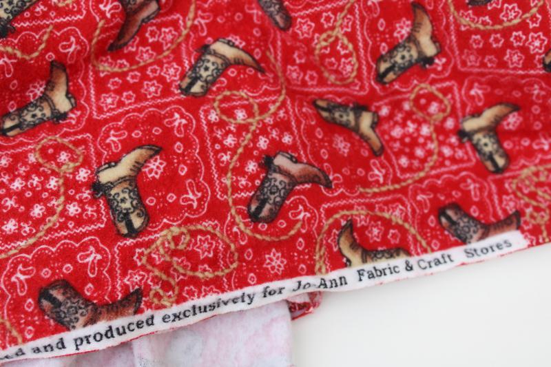 photo of western boots on red bandana print cotton flannel fabric, cowboy / cowgirl dude ranch #3