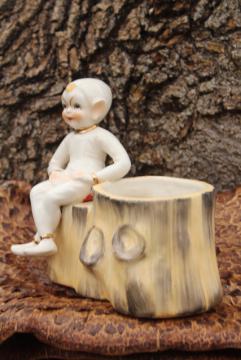 catalog photo of white Christmas 1950s vintage pixie, sitting Santa's elf ceramic planter pot vase