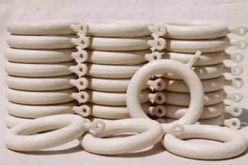 catalog photo of white wood grain plastic curtain hanging rings, big groovy vintage drapery hardware