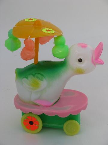 photo of wind-up vintage Easter duck toy, merry-go-round parasol flower cart #2