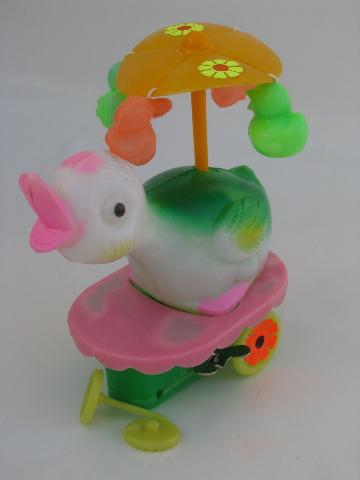 photo of wind-up vintage Easter duck toy, merry-go-round parasol flower cart #4