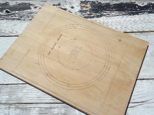 photo of wood kitchen board for cutting and rolling pastry, pie crust sizes marked #1