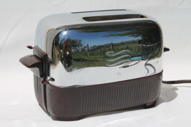 photo of working 1950s vintage GE two slice toaster, brown bakelite & shiny silver chrome #1