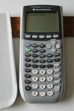 catalog photo of working Texas Instruments TI 84 Plus silver edition graphing calculator 