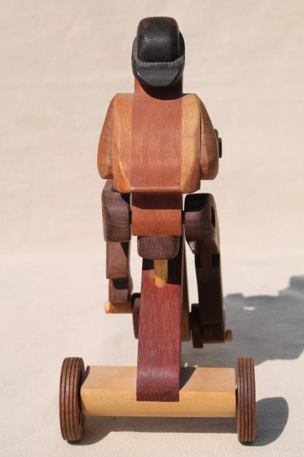 photo of working tricycle wooden toy, handmade wood folk art whimsy, man on wheels #5