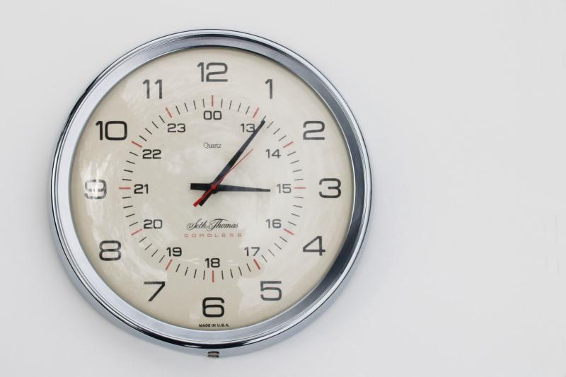 photo of working vintage industrial wall clock, Seth Thomas Quartz Manager retro chrome clock, made in USA #1