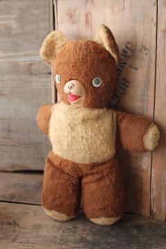 catalog photo of worn old teddy bear with googly eyes & rubber nose, mid-century vintage stuffed animal