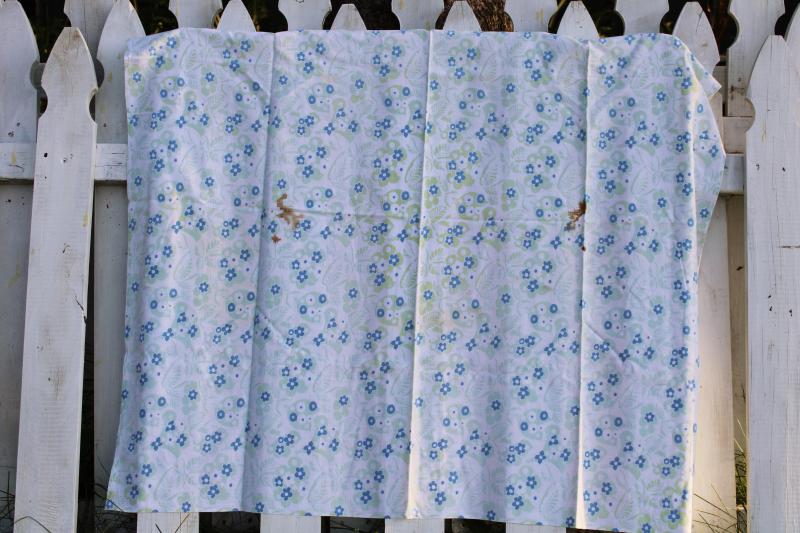 photo of worn soft vintage cotton feedsack fabric, faded print, blue & green flowers #1