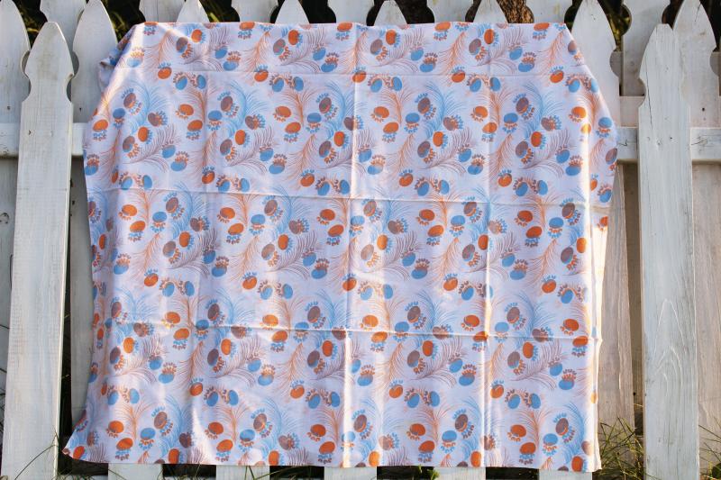 photo of worn soft vintage cotton feedsack fabric, faded print feathers blue & orange #1