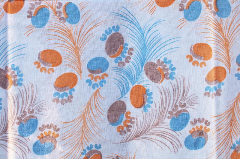 photo of worn soft vintage cotton feedsack fabric, faded print feathers blue & orange #2