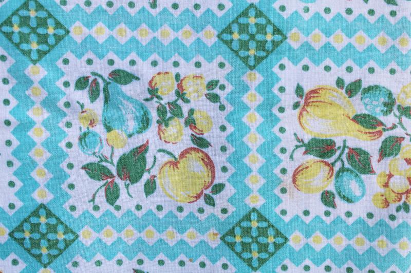 photo of worn soft vintage cotton feedsack fabric, faded print, turquoise & yellow fruit #3