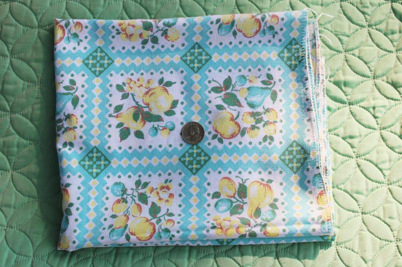 photo of worn soft vintage cotton feedsack fabric, faded print, turquoise & yellow fruit #4