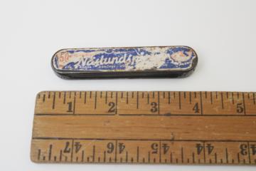 catalog photo of worn vintage Naslundspirken Sweden fishing tackle metal tin w/ lure 