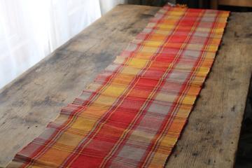 catalog photo of woven cotton table runner, orange red, mustard gold, blue, rustic country style 